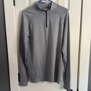 Amazing Fabletics brand 1/4 zip pullover in men’s size Medium.